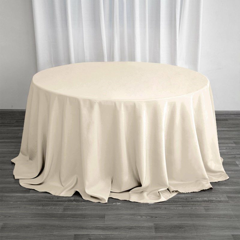 Beige Seamless Polyester Round Tablecloth 132″ for 6 Foot Table With Floor-Length Drop  |   Polyester Polyester Beige