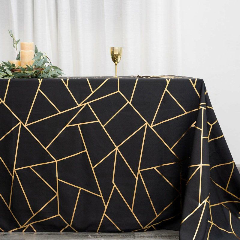 Black Seamless Rectangle Polyester Tablecloth With Gold Foil Geometric Pattern 90″x156″ for 8 Foot Table With Floor-Length Drop  |   Polyester Polyester Black