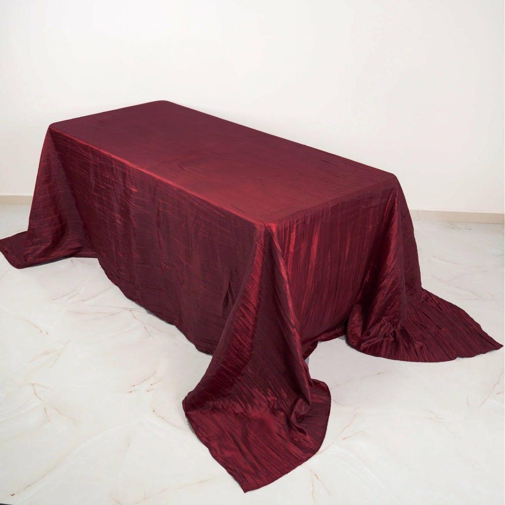 Burgundy Accordion Crinkle Taffeta Seamless Rectangular Tablecloth 90″x132″ for 6 Foot Table With Floor-Length Drop  |   Pintuck, Crinkle & Leaf Pintuck, Crinkle & Leaf Burgundy