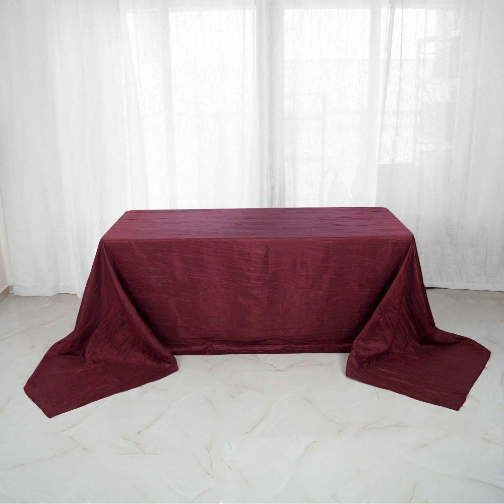 Burgundy Accordion Crinkle Taffeta Seamless Rectangular Tablecloth 90″x156″ for 8 Foot Table With Floor-Length Drop  |   Pintuck, Crinkle & Leaf Pintuck, Crinkle & Leaf Burgundy