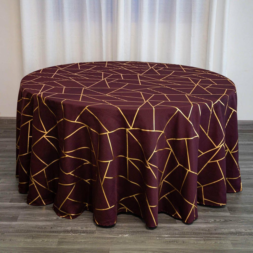 Burgundy Seamless Round Polyester Tablecloth With Gold Foil Geometric Pattern 120″ for 5 Foot Table With Floor-Length Drop  |   Polyester Polyester Burgundy