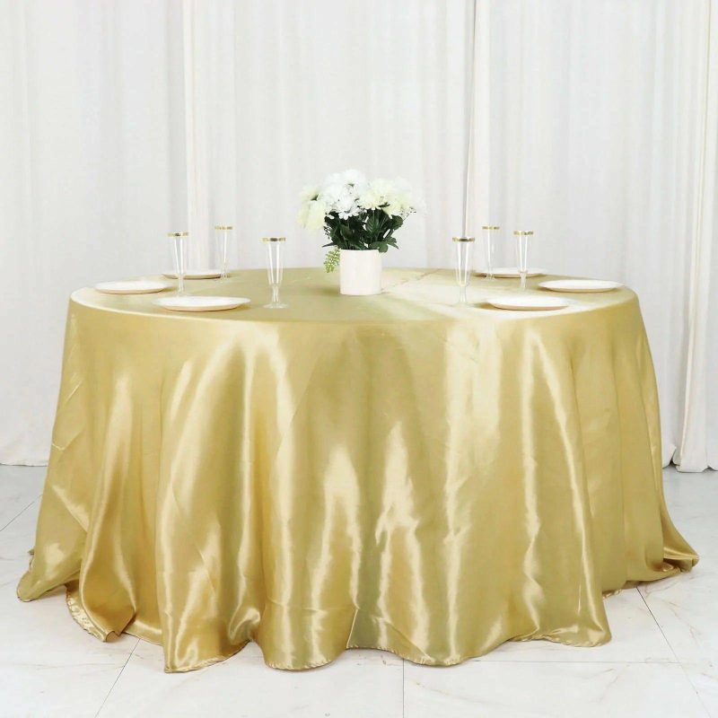 Champagne Seamless Satin Round Tablecloth 132″ for 6 Foot Table With Floor-Length Drop  |   Satin Satin Champagne