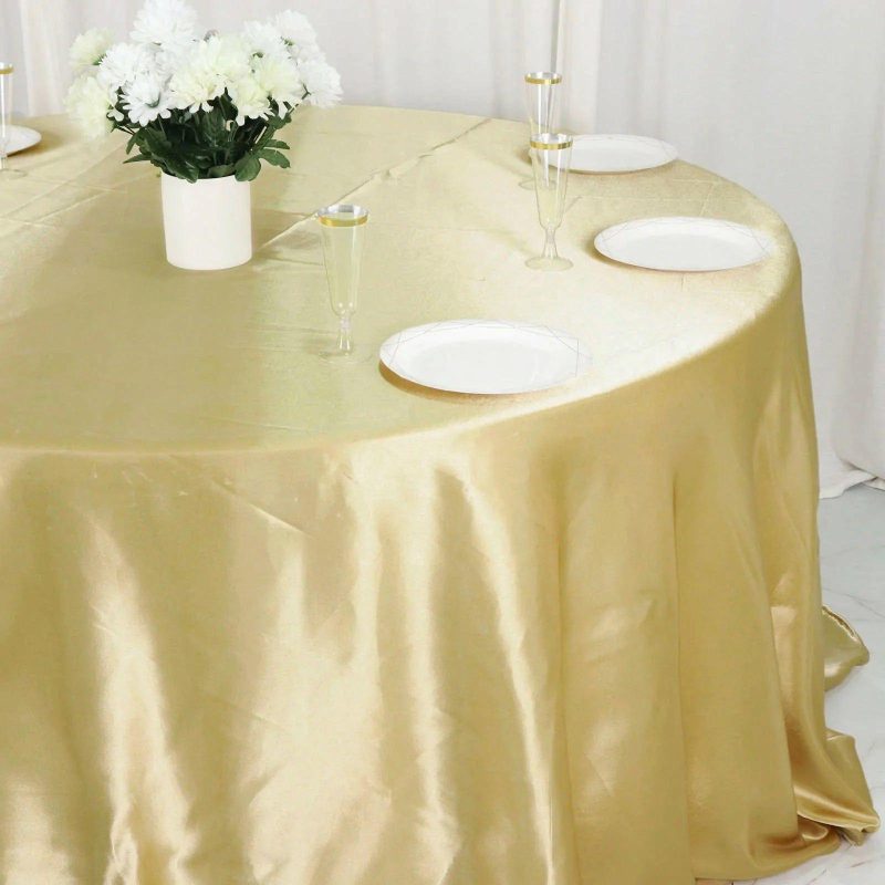 Champagne Seamless Satin Round Tablecloth 132″ for 6 Foot Table With Floor-Length Drop  |   Satin Satin Champagne