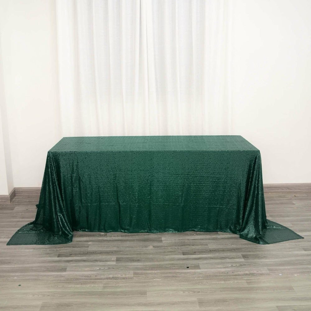 Hunter Emerald Green Seamless Premium Sequin Rectangle Tablecloth 90″x132″ for 6 Foot Table With Floor-Length Drop  |   Sequin Sequin Hunter Emerald Green