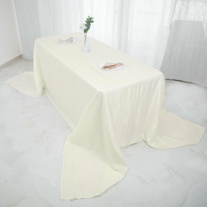 Ivory Accordion Crinkle Taffeta Seamless Rectangular Tablecloth 90″x156″ for 8 Foot Table With Floor-Length Drop  |   Pintuck, Crinkle & Leaf Pintuck, Crinkle & Leaf Ivory