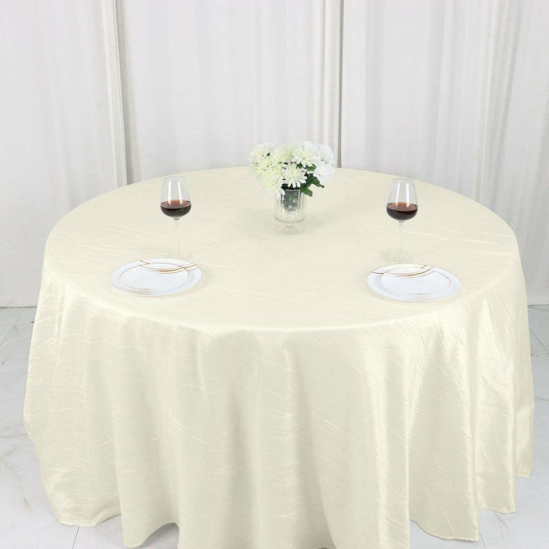 Ivory Accordion Crinkle Taffeta Seamless Round Tablecloth 132″ for 6 Foot Table With Floor-Length Drop  |   Pintuck, Crinkle & Leaf Pintuck, Crinkle & Leaf Ivory