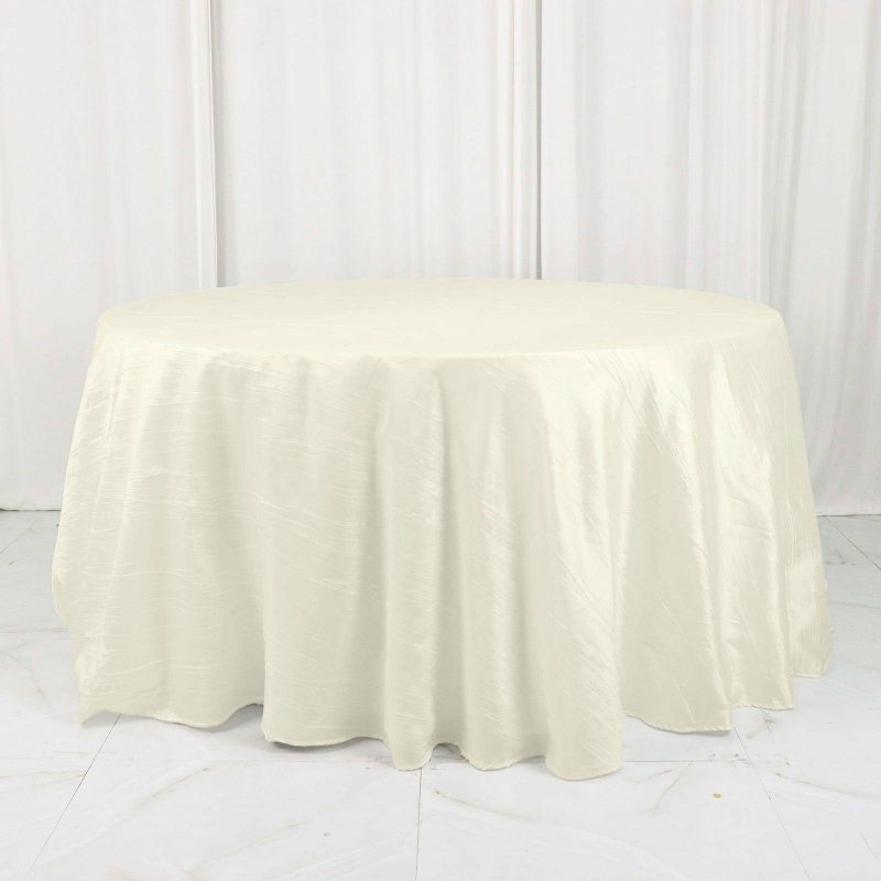 Ivory Accordion Crinkle Taffeta Seamless Round Tablecloth 132″ for 6 Foot Table With Floor-Length Drop  |   Pintuck, Crinkle & Leaf Pintuck, Crinkle & Leaf Ivory