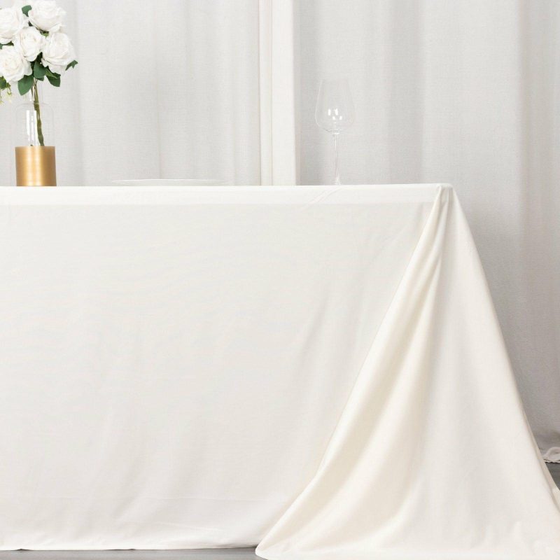 Ivory Premium Scuba Rectangular Tablecloth, Wrinkle Free Polyester Seamless Tablecloth 90″x132″ for 6 Foot Table With Floor-Length Drop  |   Polyester Polyester Ivory