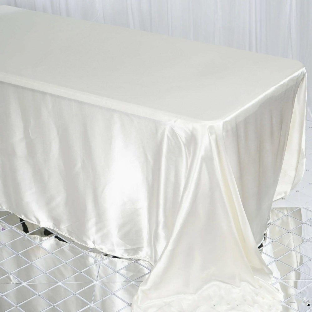 Ivory Satin Seamless Rectangular Tablecloth 90″x132″ for 6 Foot Table With Floor-Length Drop  |   Satin Satin Ivory