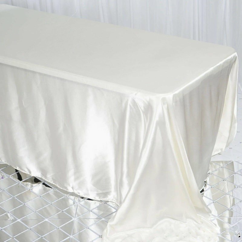 Ivory Satin Seamless Rectangular Tablecloth 90″x132″ for 6 Foot Table With Floor-Length Drop  |   Satin Satin Ivory