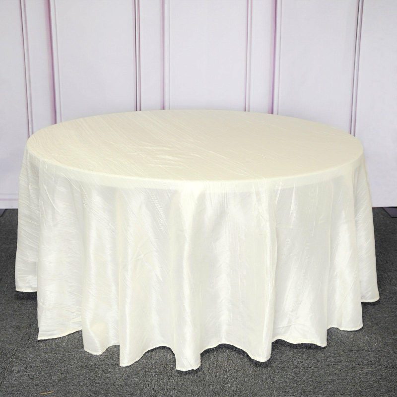 Ivory Seamless Accordion Crinkle Taffeta Round Tablecloth 120″ for 5 Foot Table With Floor-Length Drop  |   Pintuck, Crinkle & Leaf Pintuck, Crinkle & Leaf Ivory