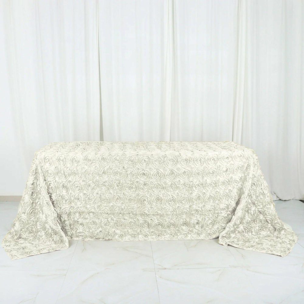 Ivory Seamless Grandiose 3D Rosette Satin Rectangle Tablecloth 90″x132″ for 6 Foot Table With Floor-Length Drop  |   Rosette Rosette Ivory