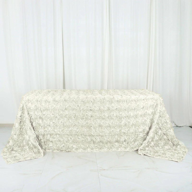 Ivory Seamless Grandiose 3D Rosette Satin Rectangle Tablecloth 90″x132″ for 6 Foot Table With Floor-Length Drop  |   Rosette Rosette Ivory