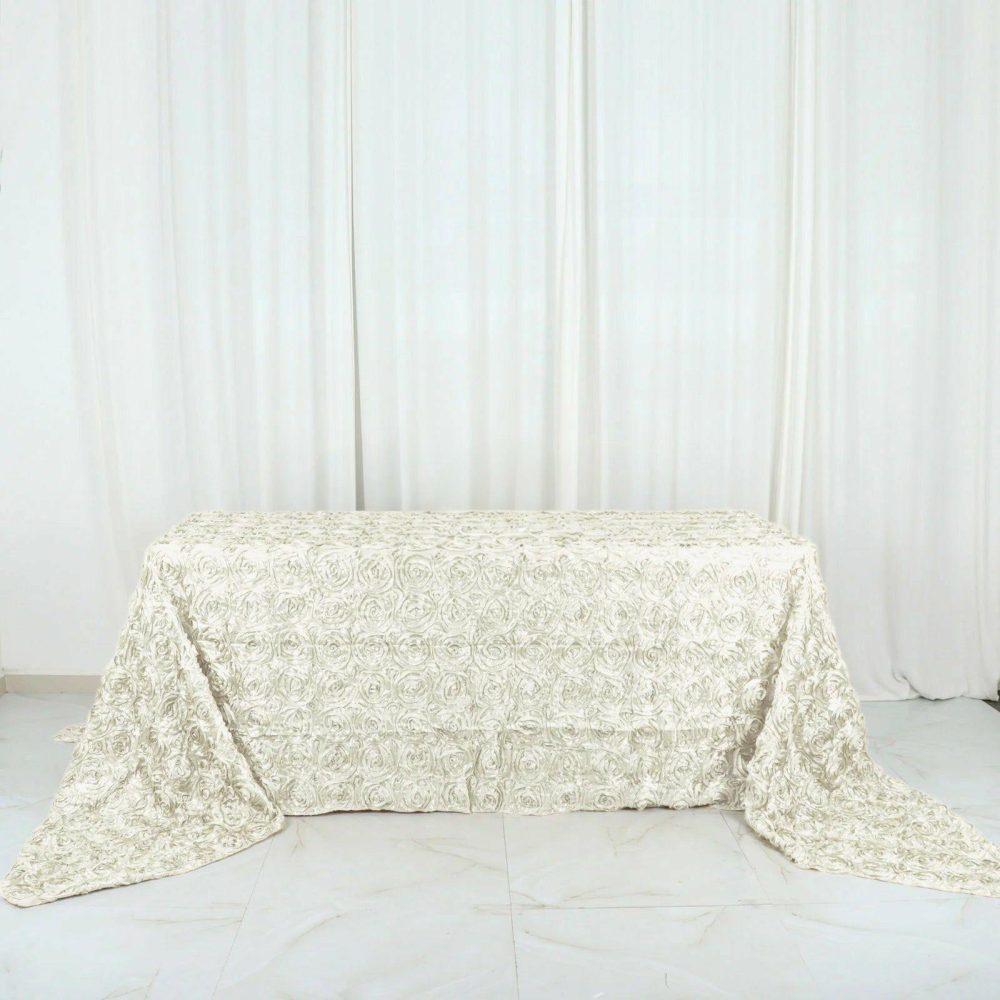 Ivory Seamless Grandiose Rosette 3D Satin Rectangle Tablecloth 90″x156″ for 8 Foot Table With Floor-Length Drop  |   Rosette Rosette Ivory