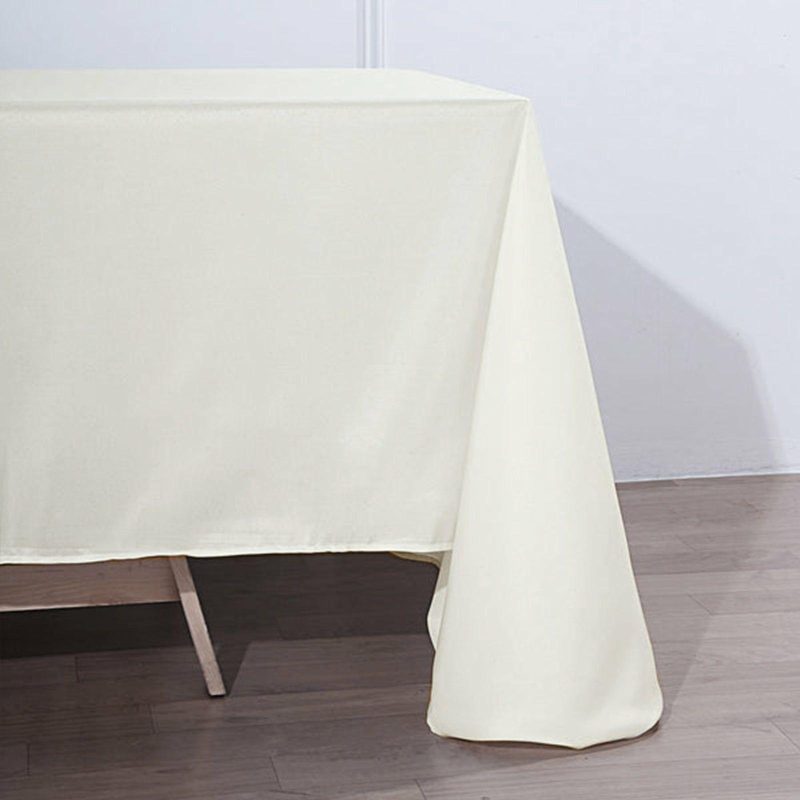 Ivory Seamless Polyester Rectangular Tablecloth 90″x132″ for 6 Foot Table With Floor-Length Drop  |   Polyester Polyester Ivory