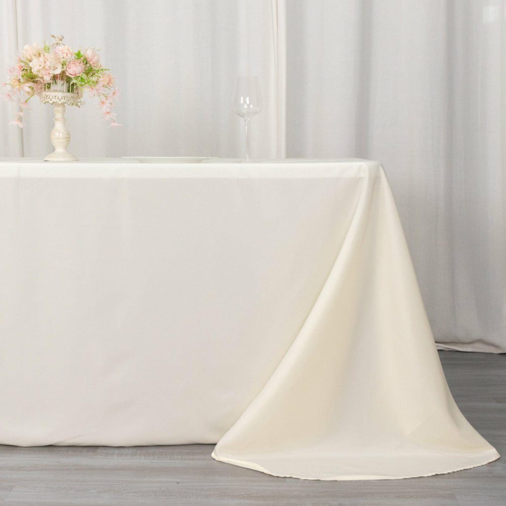 Ivory Seamless Polyester Rectangular Tablecloth with Rounded Corners, Oval Oblong Tablecloth – 90″x132″ for 6 Foot Table With Floor-Length Drop  |   Polyester Polyester Ivory