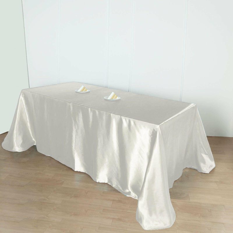 Ivory Seamless Satin Rectangular Tablecloth 90″x156″ for 8 Foot Table With Floor-Length Drop  |   Satin Satin Ivory