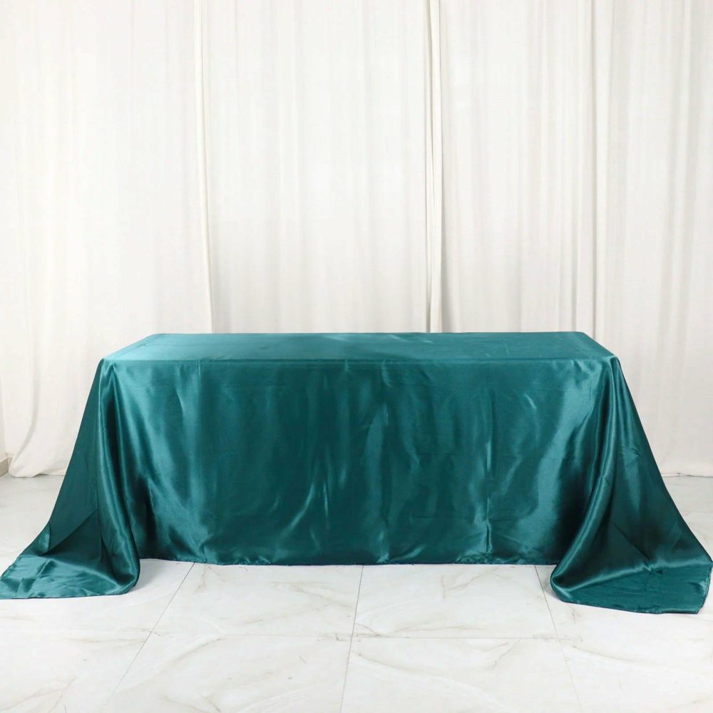 Peacock Teal Satin Seamless Rectangular Tablecloth 90″x132″ for 6 Foot Table With Floor-Length Drop  |   Satin Satin Peacock Teal