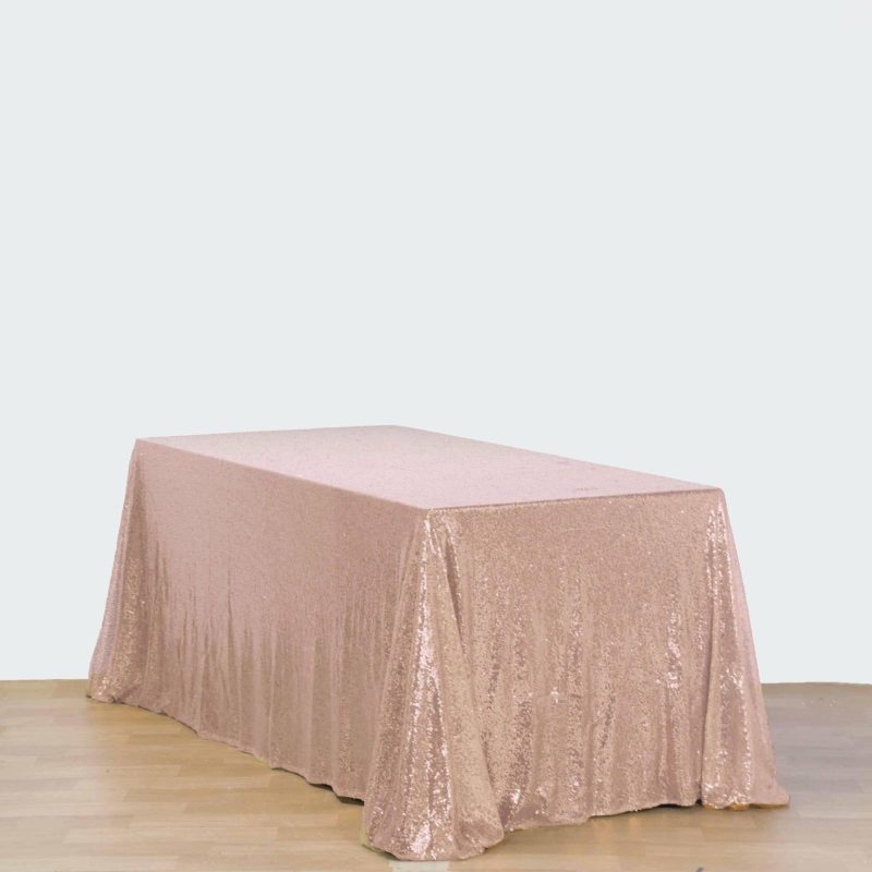 Rose Gold Seamless Premium Sequin Rectangle Tablecloth 90″x132″ for 6 Foot Table With Floor-Length Drop  |   Sequin Sequin Rose gold