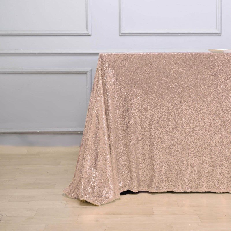 Rose Gold Seamless Premium Sequin Rectangle Tablecloth 90″x132″ for 6 Foot Table With Floor-Length Drop  |   Sequin Sequin Rose gold