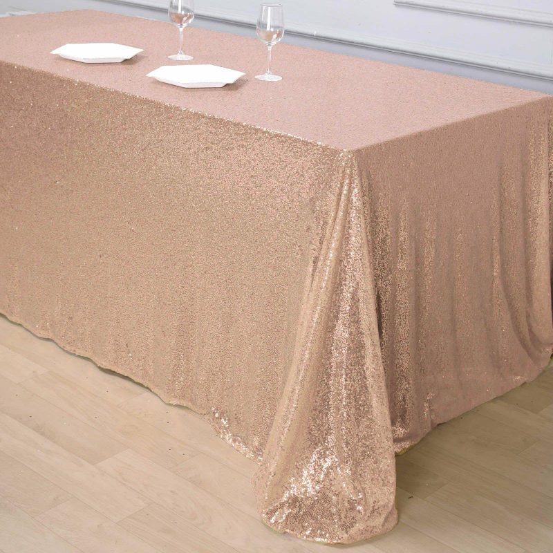 Rose Gold Seamless Premium Sequin Rectangle Tablecloth 90×156″ for 8 Foot Table With Floor-Length Drop  |   Sequin Sequin Rose gold