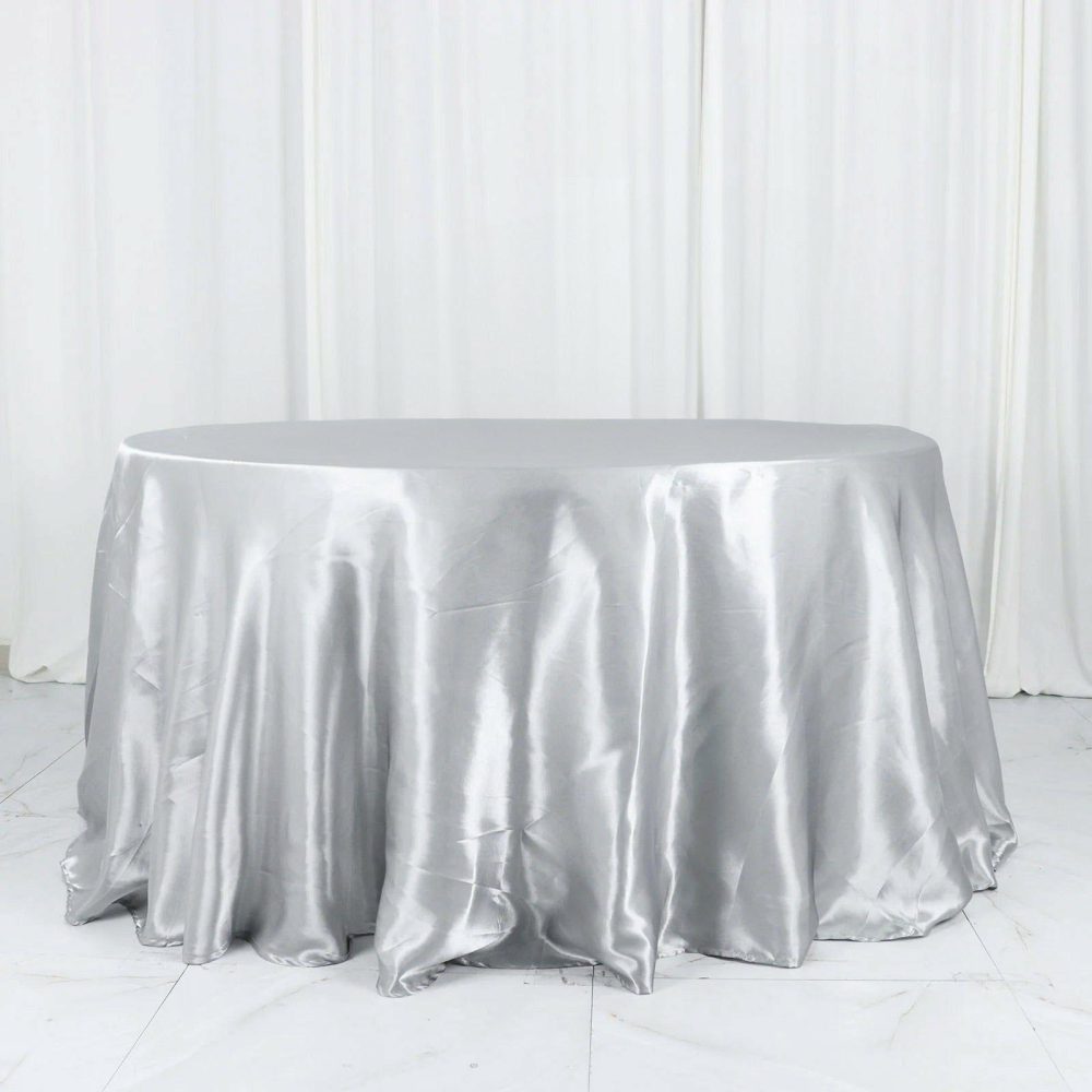 Silver Seamless Satin Round Tablecloth 132″ for 6 Foot Table With Floor-Length Drop  |   Satin Satin Satin