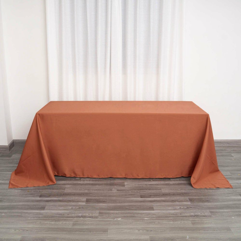 Terracotta (Rust) Seamless Polyester Rectangular Tablecloth – 90″x132″ for 6 Foot Table With Floor-Length Drop  |   Polyester Polyester Polyester