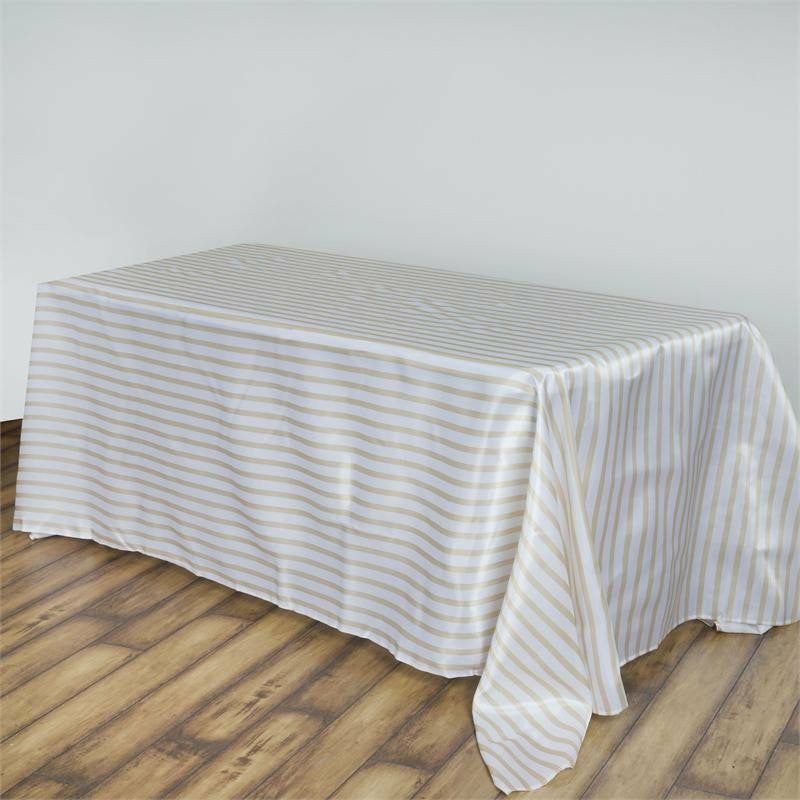 White/Champagne Seamless Stripe Satin Rectangle Tablecloth 90″x156″ for 8 Foot Table With Floor-Length Drop  |   Satin Satin Champagne